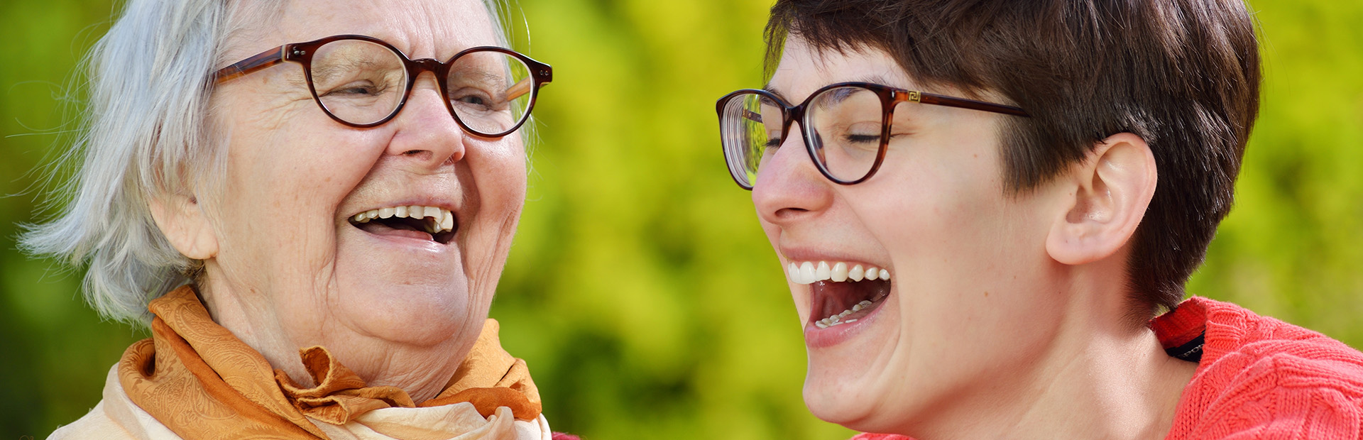 Grandmother and granddaughter. Young woman carefully takes care