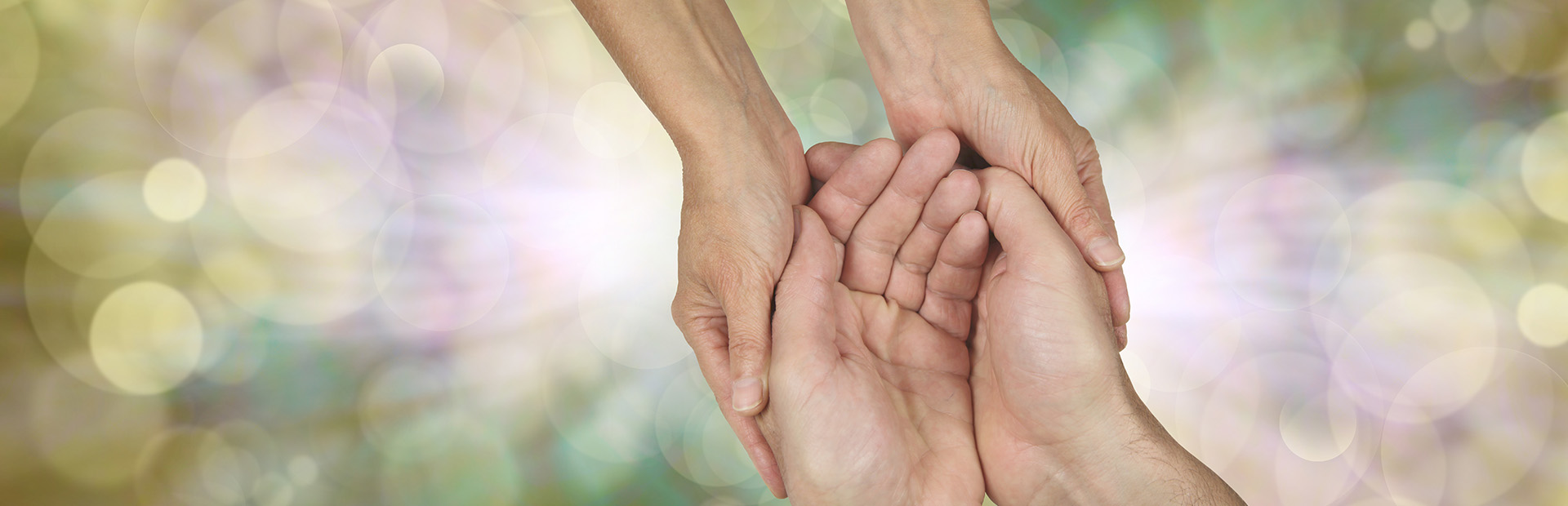 Compassion banner - wide banner with a woman's hands holding a